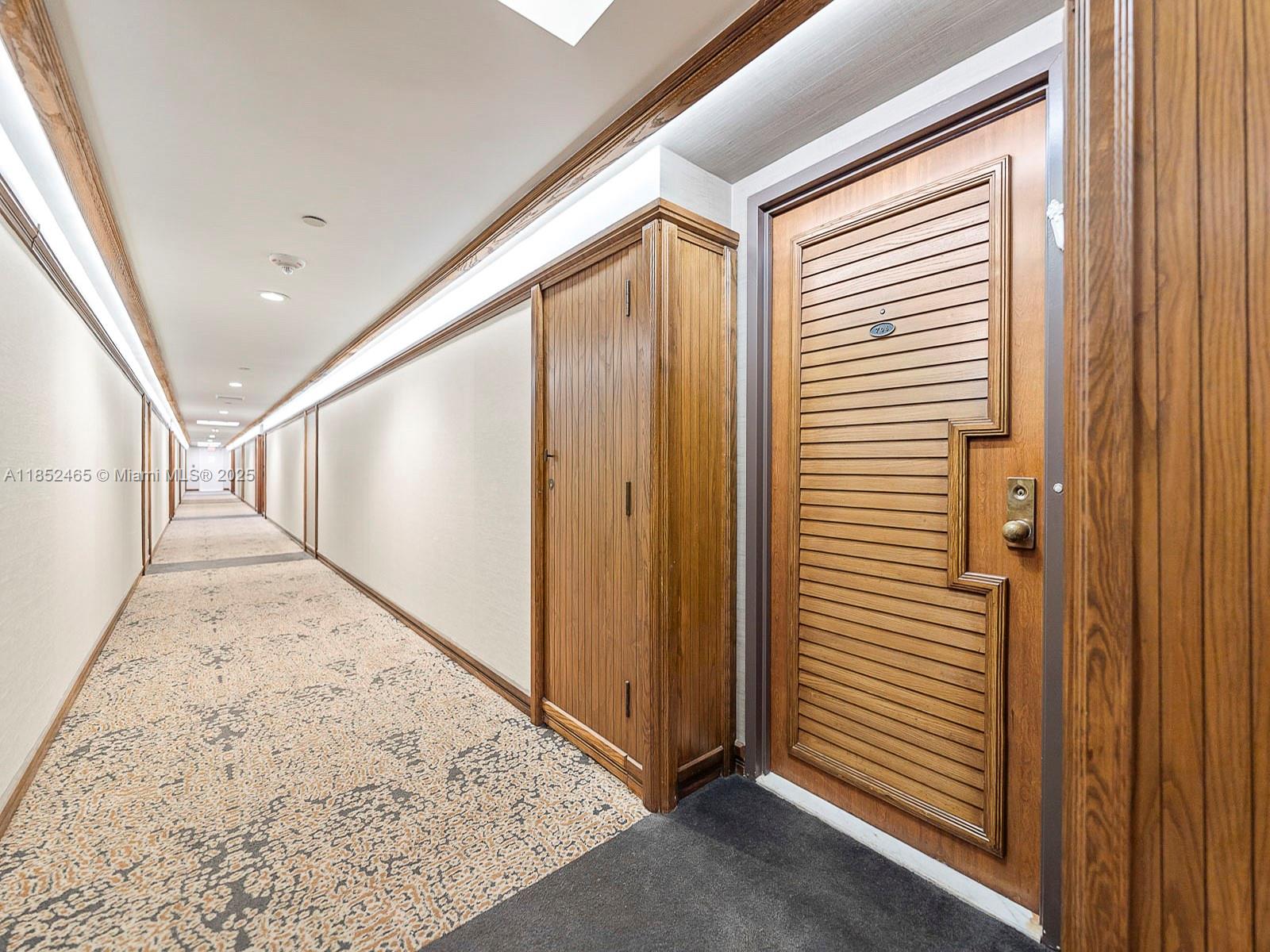 1000 Quayside Terrace, Unit 706 Miami, FL 33138 - Photo 24 of 33 a view of a hallway