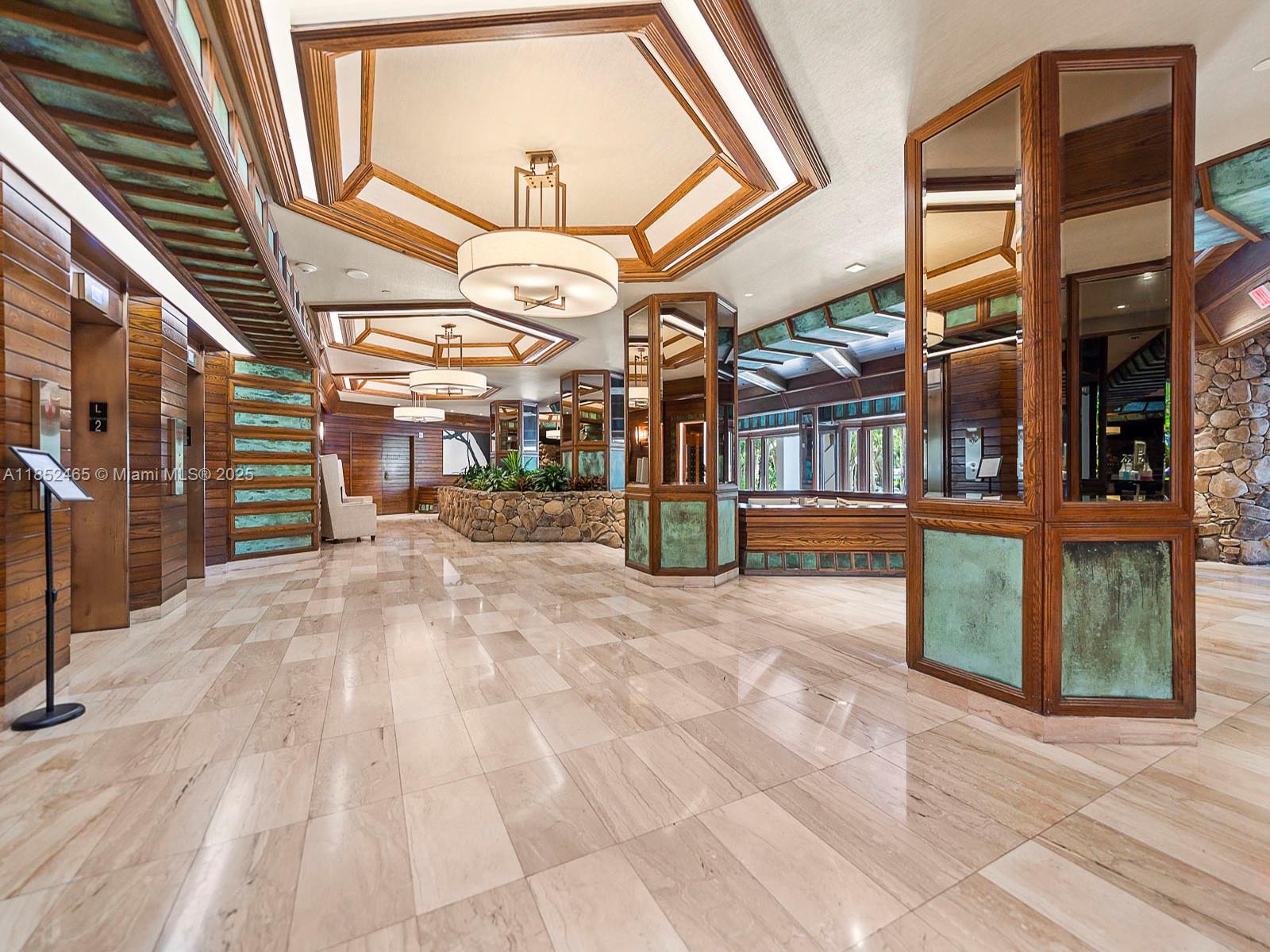 1000 Quayside Terrace, Unit 706 Miami, FL 33138 - Photo 25 of 33 a view of a building with a street