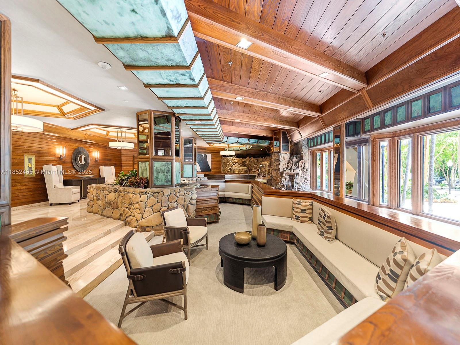 1000 Quayside Terrace, Unit 706 Miami, FL 33138 - Photo 26 of 33 a outdoor living space with patio furniture and a potted plant