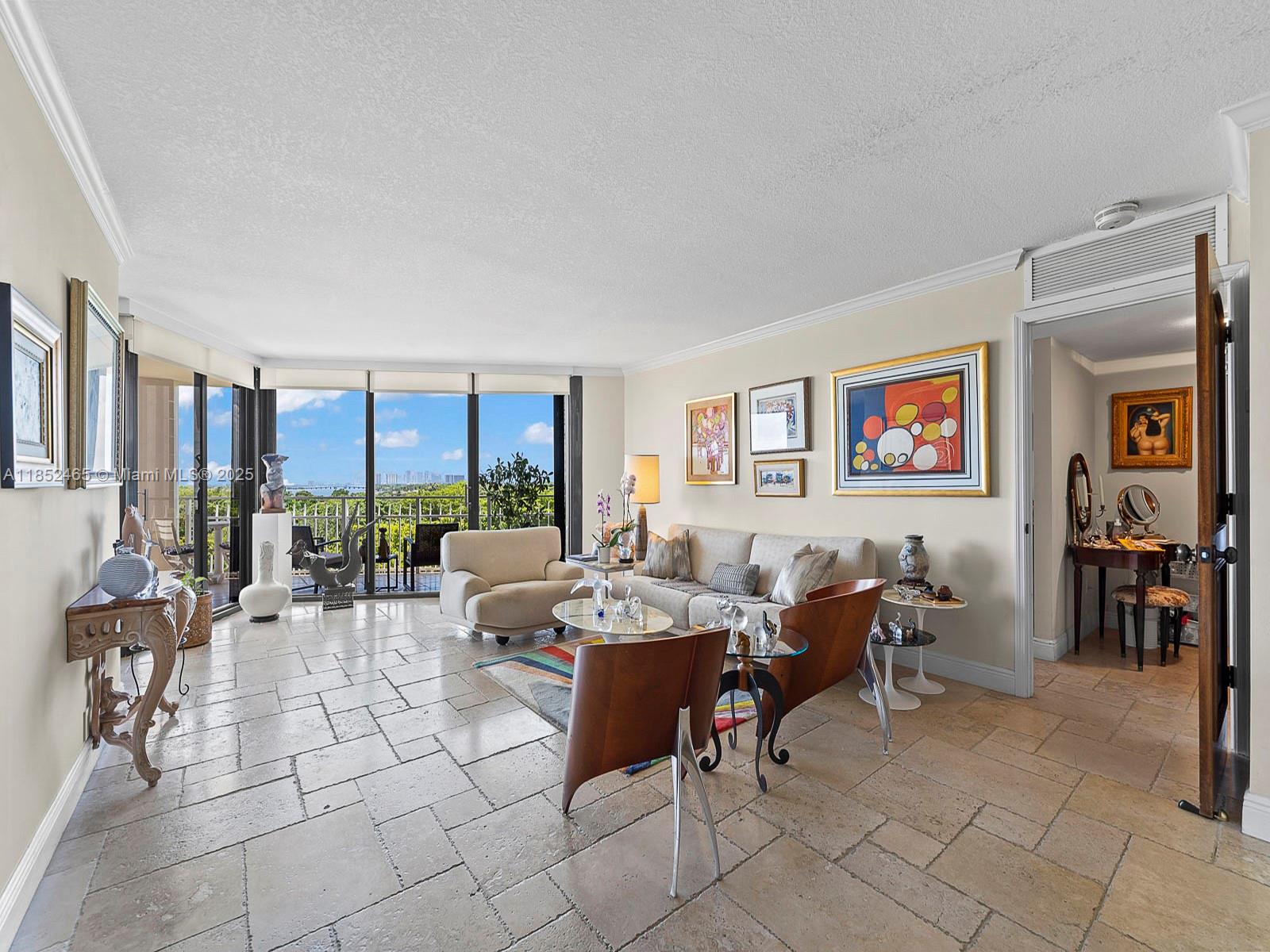 1000 Quayside Terrace, Unit 706 Miami, FL 33138 - Photo 4 of 33 a room with lots of furniture and view of living room