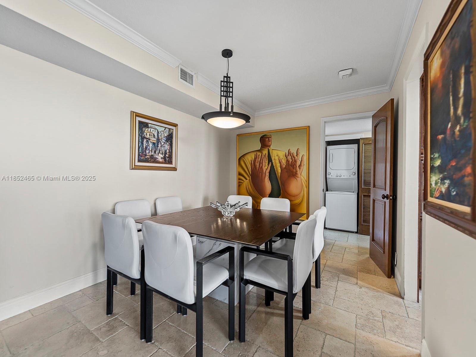 1000 Quayside Terrace, Unit 706 Miami, FL 33138 - Photo 6 of 33 a dining room with furniture and window