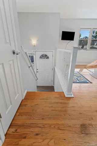 a view of a livingroom with wooden floor