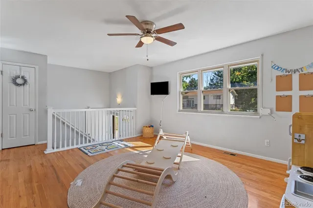 a bed room with a bed and a window