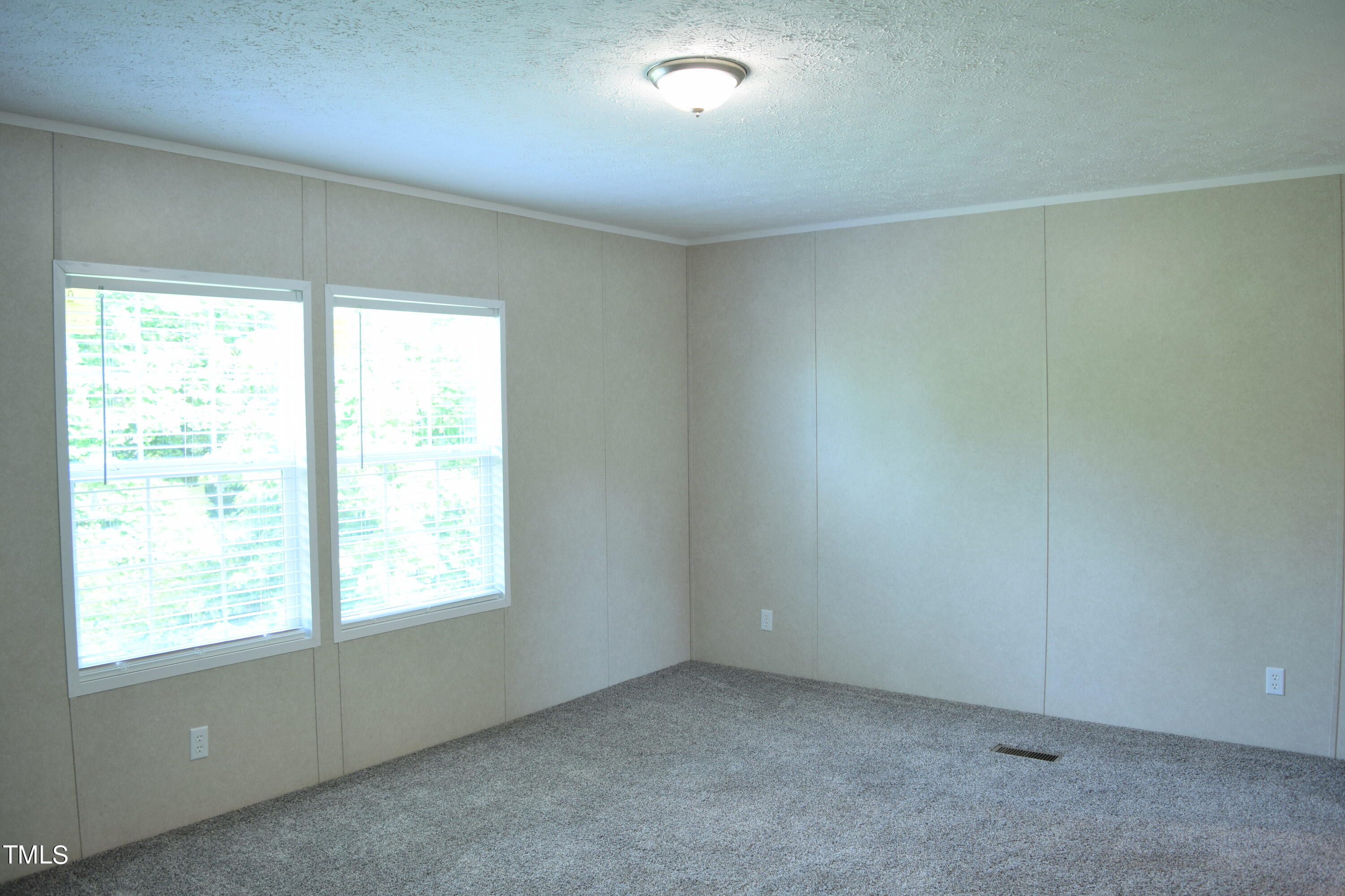 4370 Needham Road Bailey, NC 27807 - Photo 15 of 41 an empty room with a window