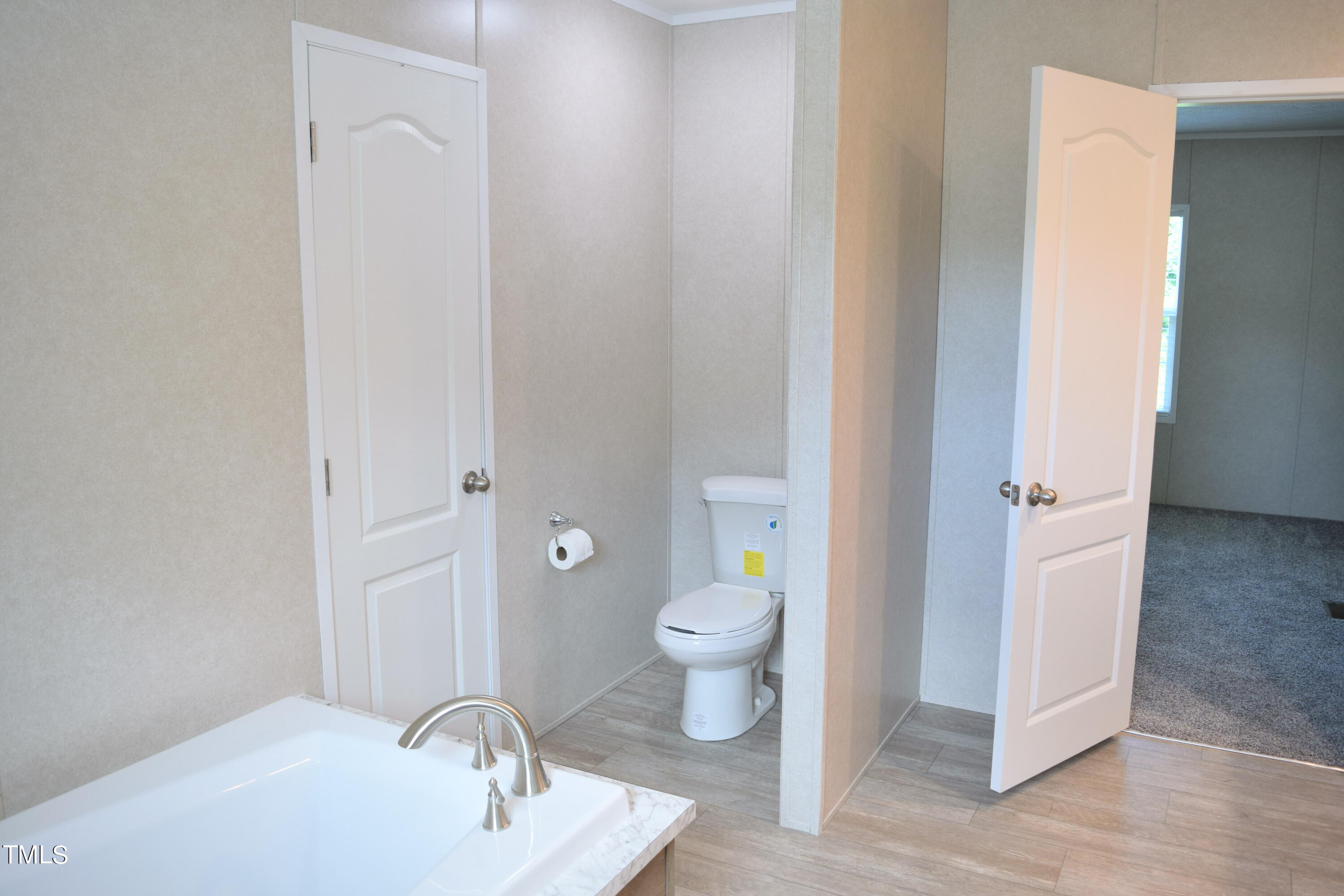 4370 Needham Road Bailey, NC 27807 - Photo 21 of 41 a bathroom with a sink and a toilet