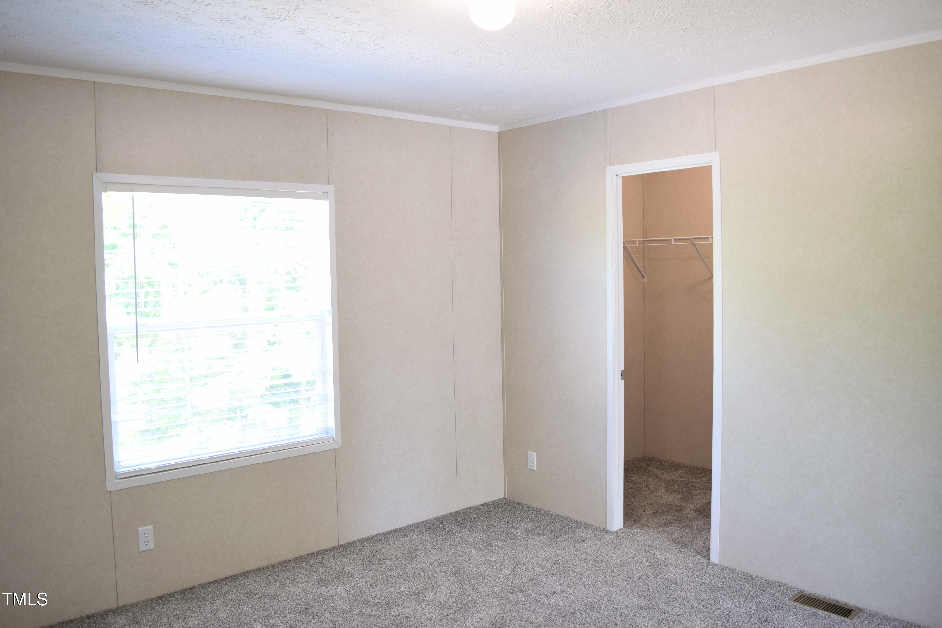 4370 Needham Road Bailey, NC 27807 - Photo 24 of 41 a view of an empty room with a window