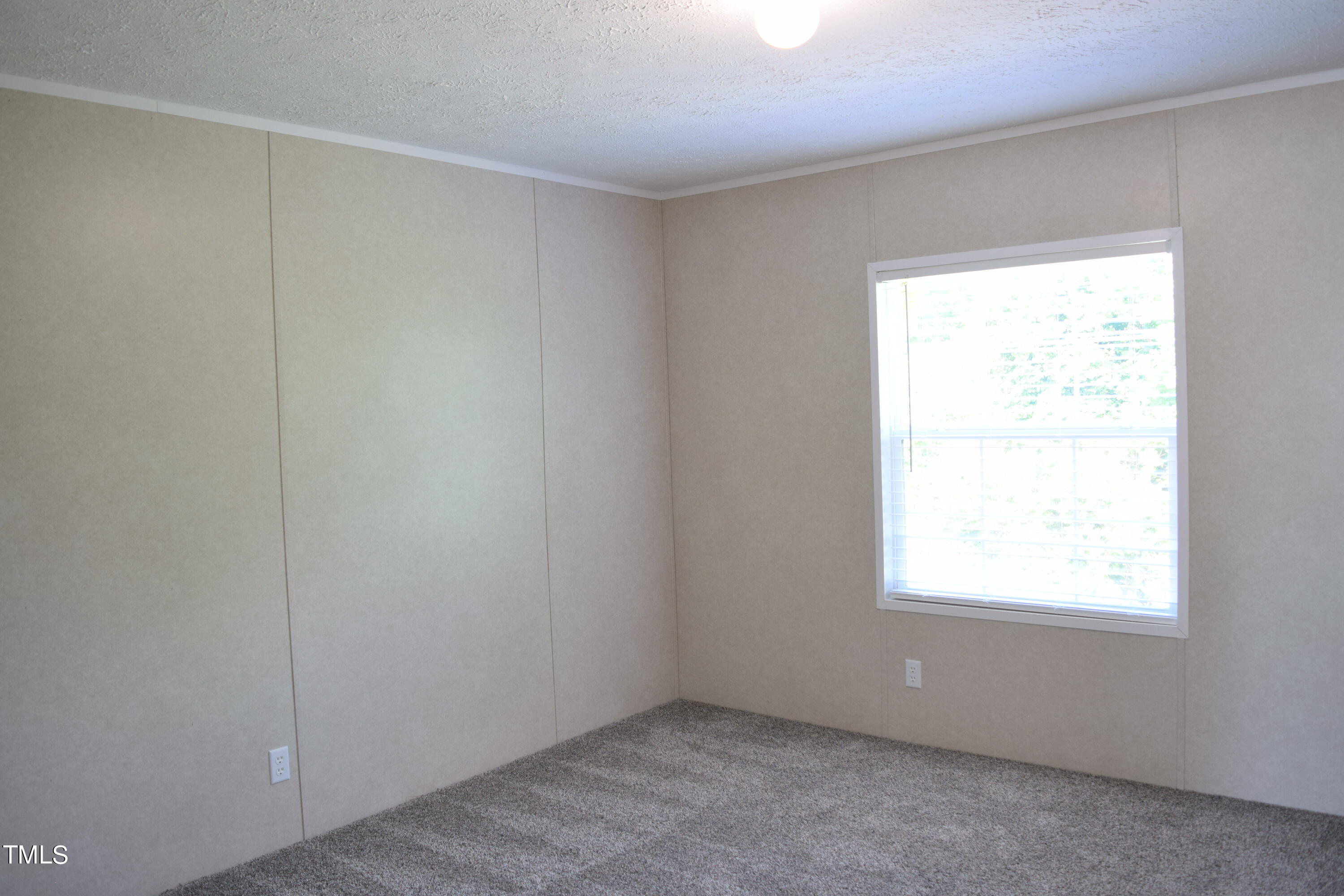4370 Needham Road Bailey, NC 27807 - Photo 25 of 41 an empty room with a window