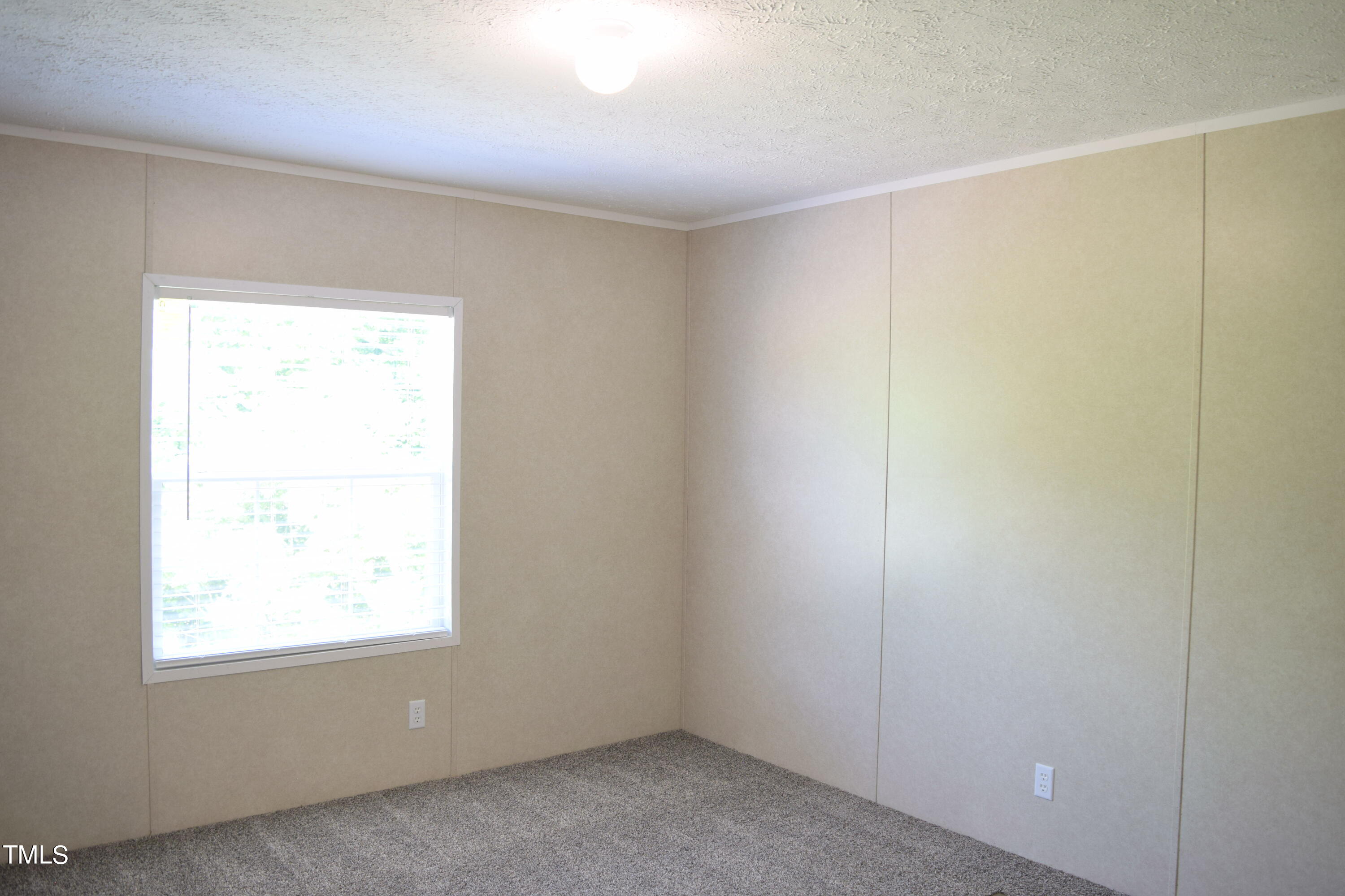 4370 Needham Road Bailey, NC 27807 - Photo 28 of 41 an empty room with a window