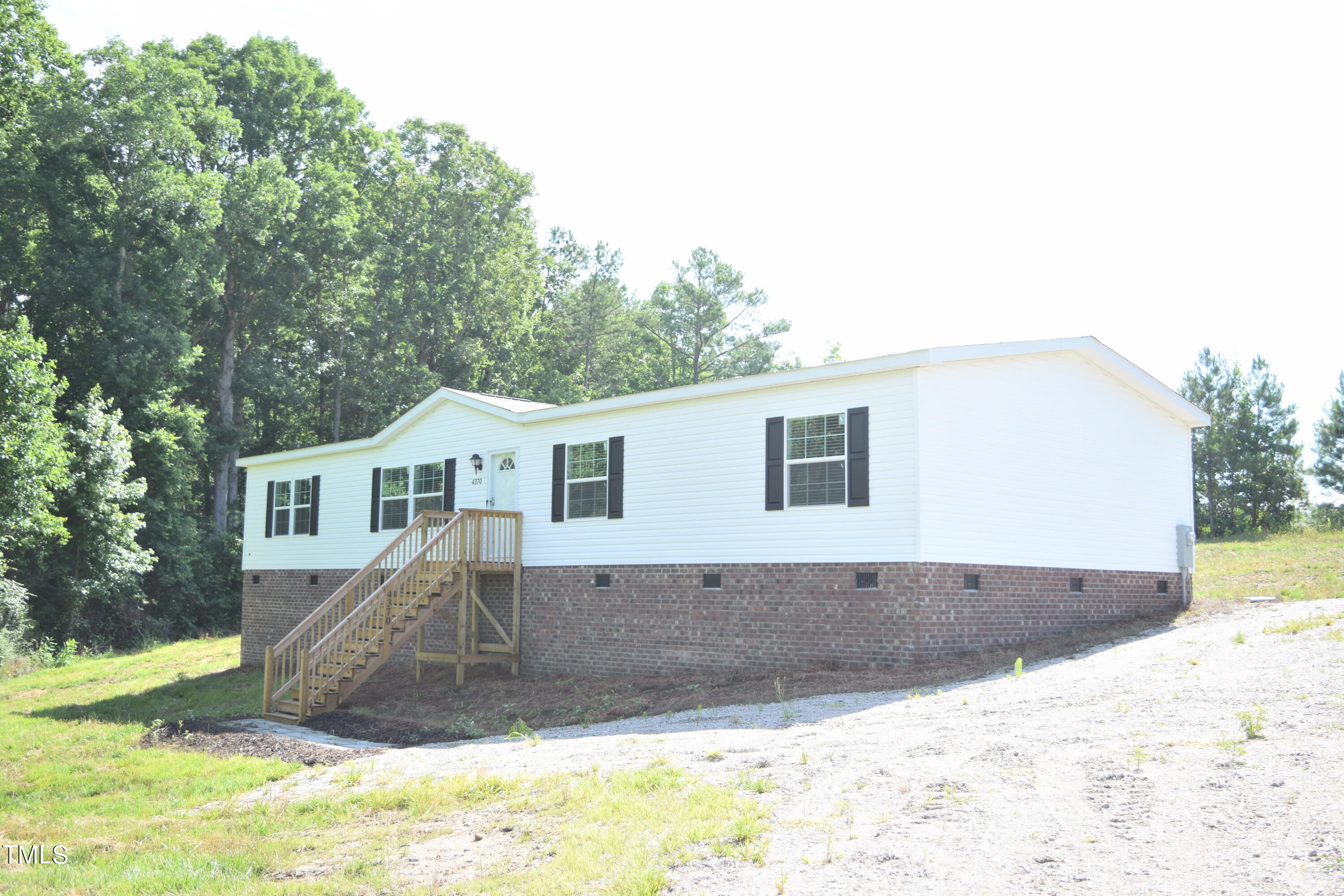 4370 Needham Road Bailey, NC 27807 - Photo 40 of 41 a view of a house with a yard