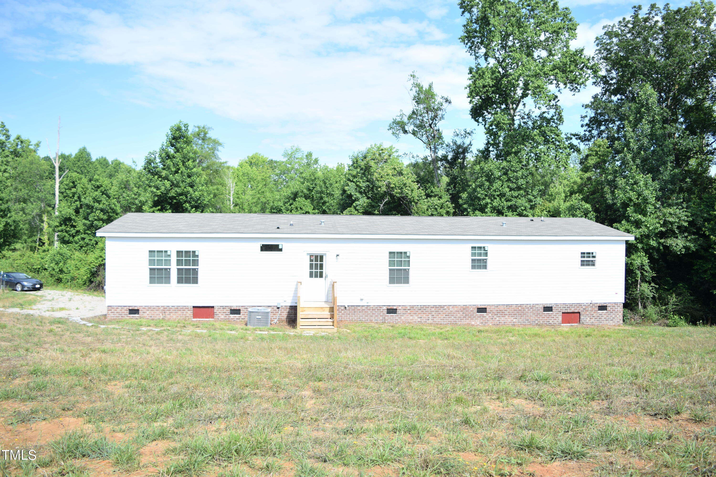 4370 Needham Road Bailey, NC 27807 - Photo 41 of 41 a view of a house with yard and sitting area