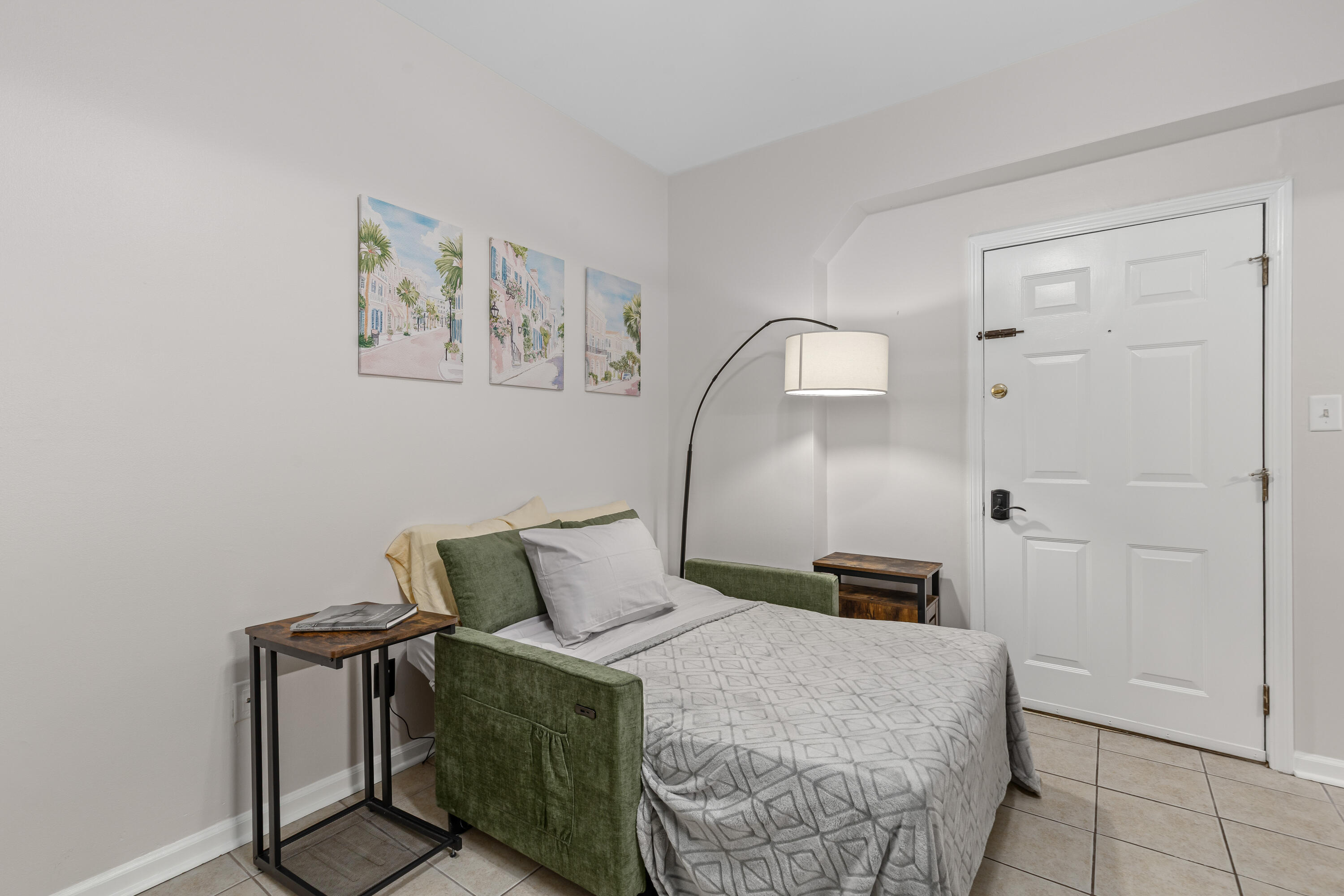 24 Bee Street, Unit F Charleston, SC 29403 - Photo 13 of 15 Couch Pulled out into twin XL bed