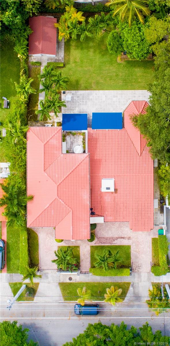 244 Southwest 28th Road Miami, FL 33129 - Photo 2 of 43 a view of swimming pool with a yard