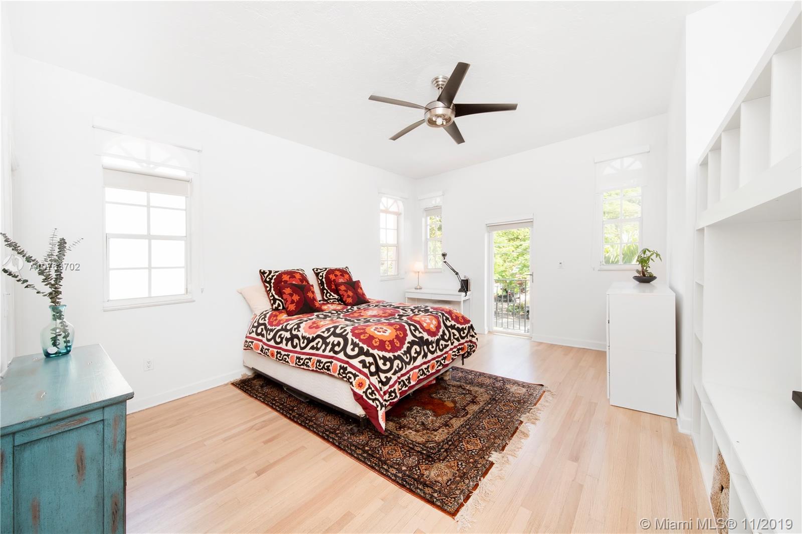 244 Southwest 28th Road Miami, FL 33129 - Photo 39 of 43 a bedroom with a bed and a window