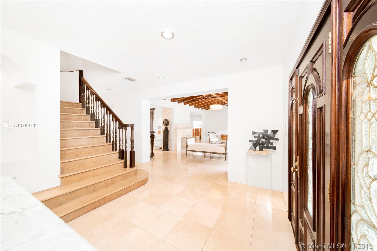 244 Southwest 28th Road Miami, FL 33129 - Photo 6 of 43 a view of a living room and entryway