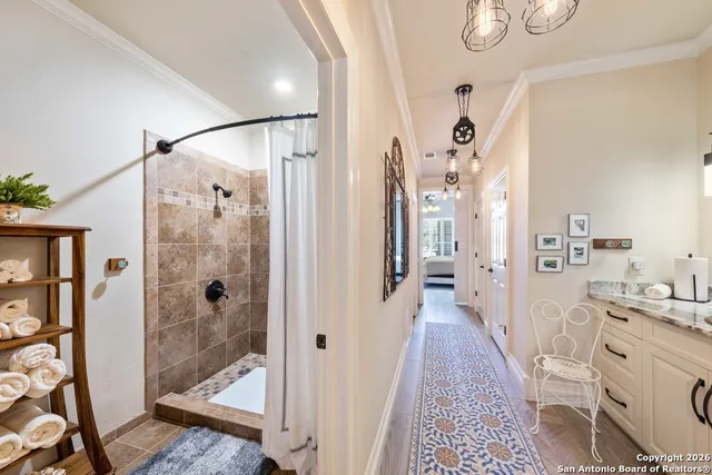 a view of roof deck with patio