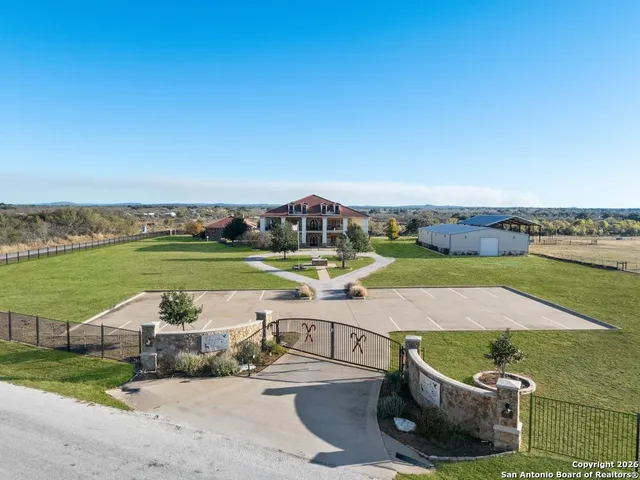 a view of swimming pool with outdoor seating