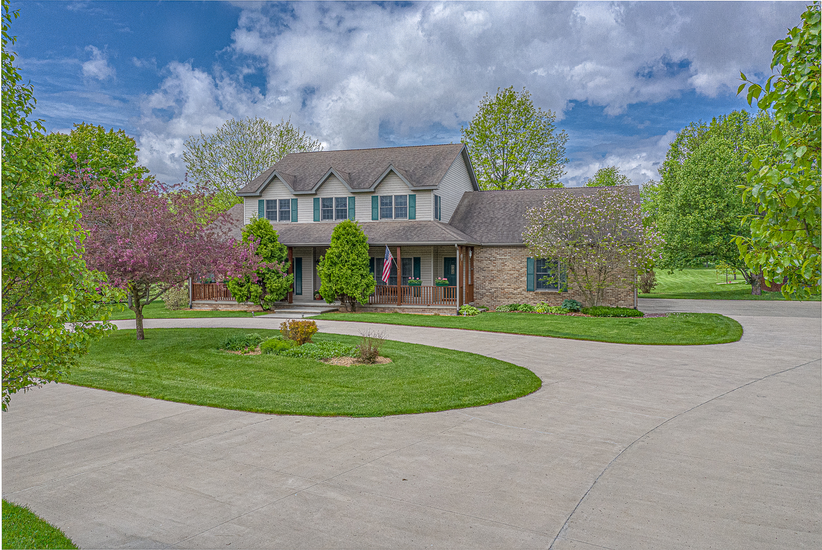 1901 Wildcat Road Dixon, IL 61021 - Photo 1 of 49 a view of a house with a garden