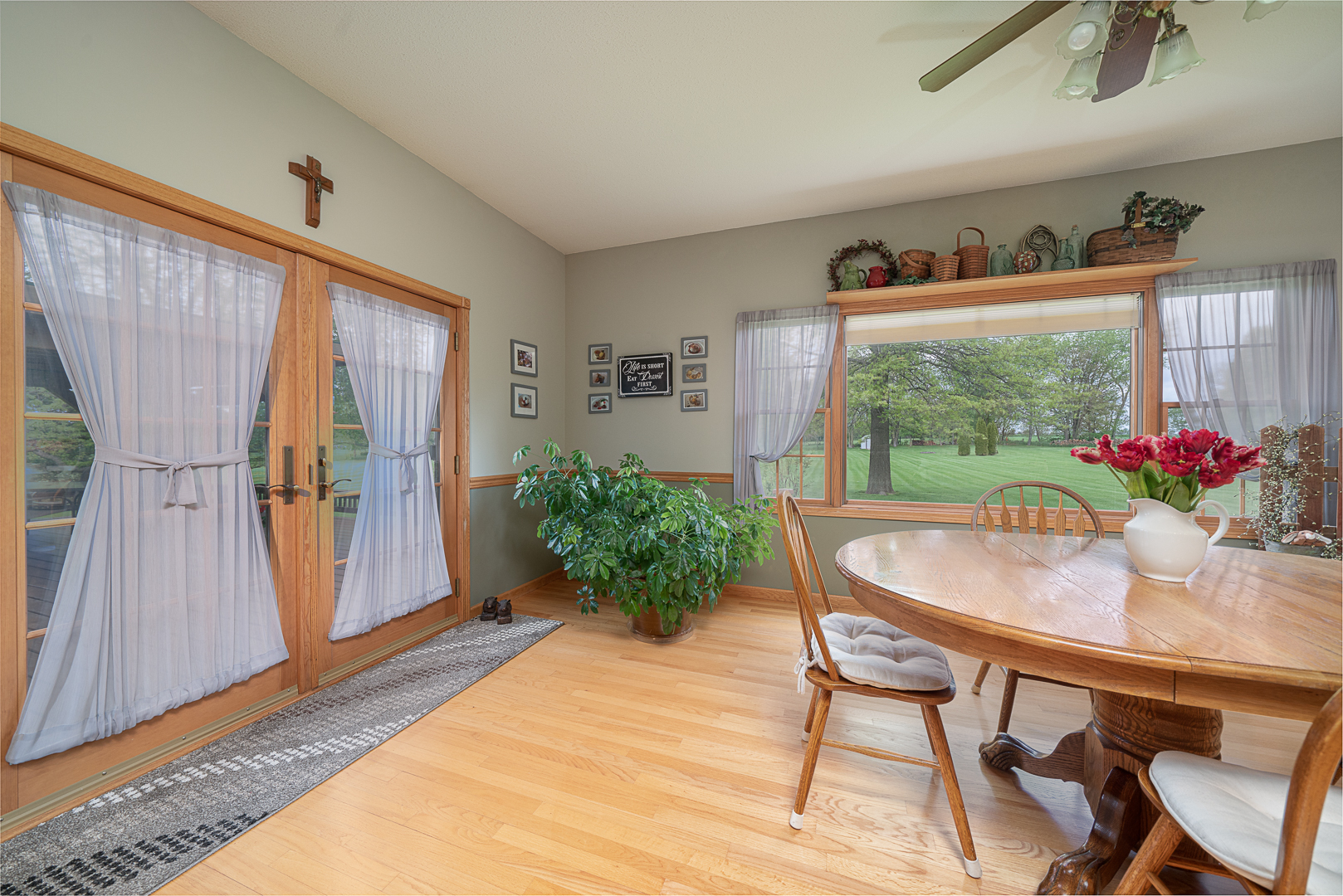1901 Wildcat Road Dixon, IL 61021 - Photo 12 of 49 a dining room with furniture and wooden floor