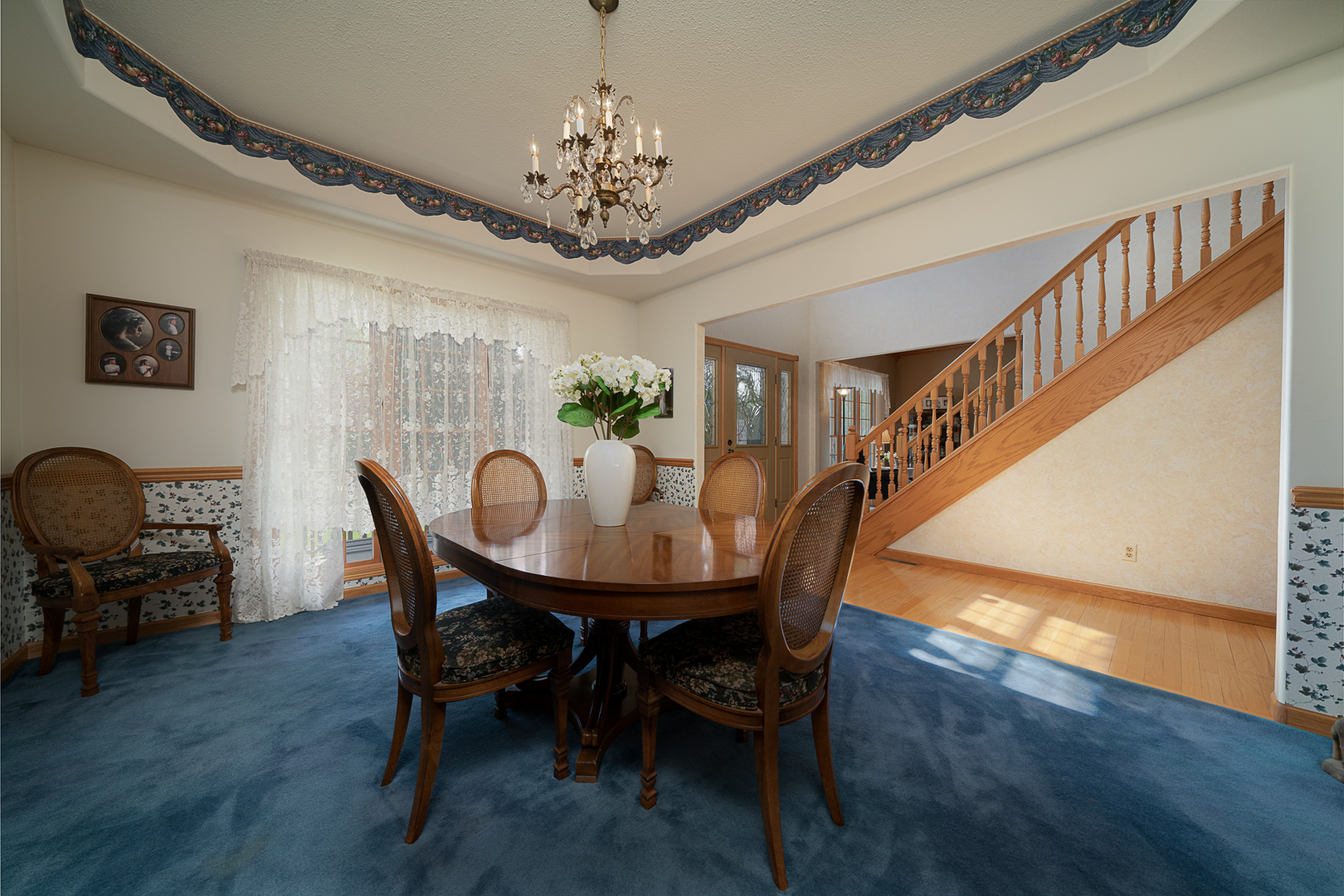 1901 Wildcat Road Dixon, IL 61021 - Photo 3 of 49 a view of a dining room with furniture and wooden floor