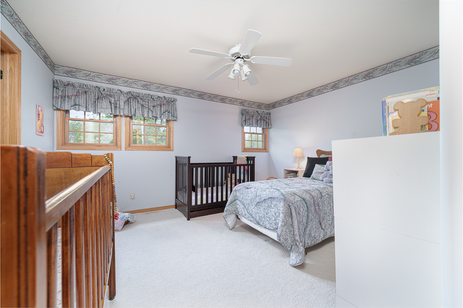 1901 Wildcat Road Dixon, IL 61021 - Photo 25 of 49 a living room with a bed furniture and a large window