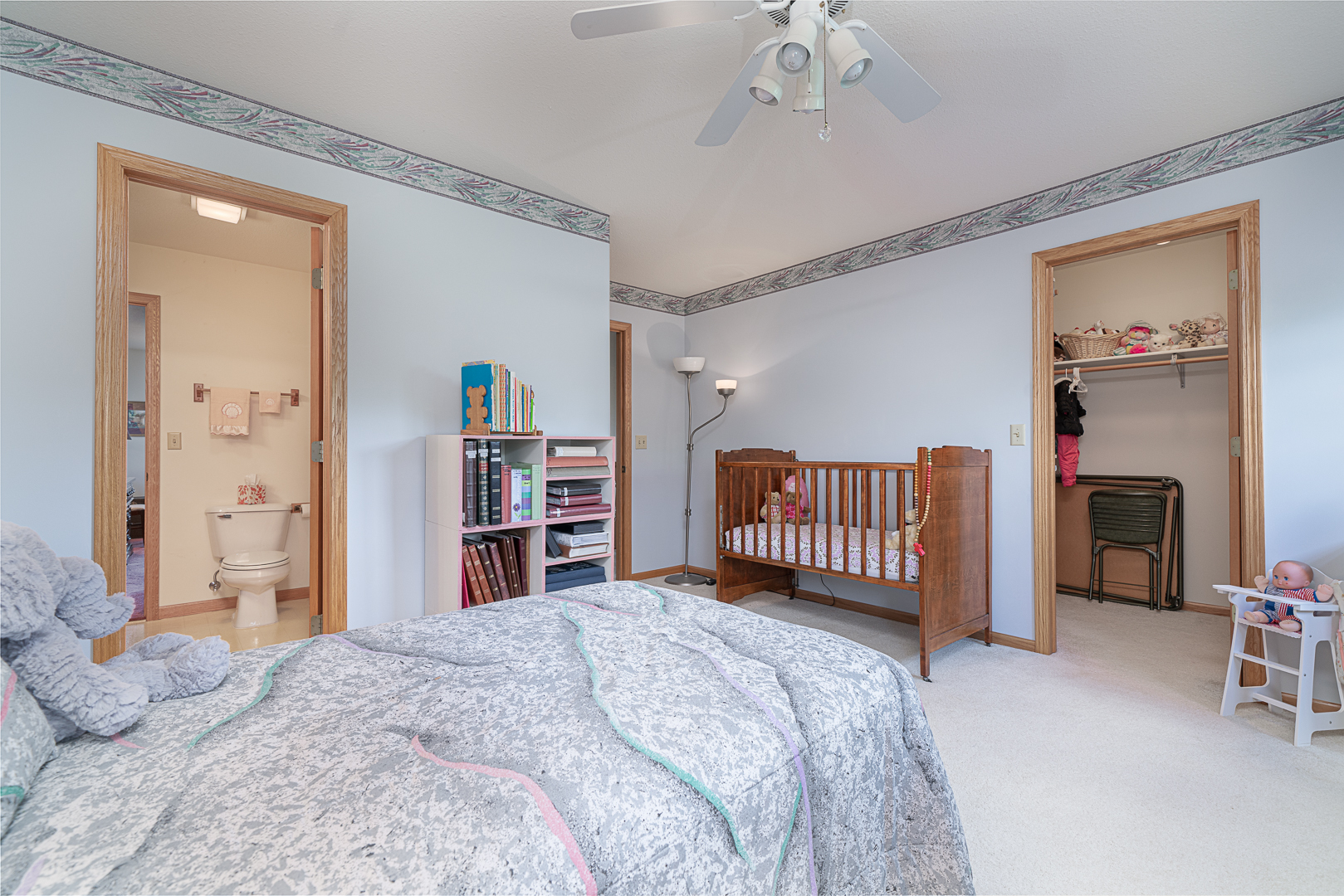 1901 Wildcat Road Dixon, IL 61021 - Photo 26 of 49 a bedroom with a bed closet and a mirror