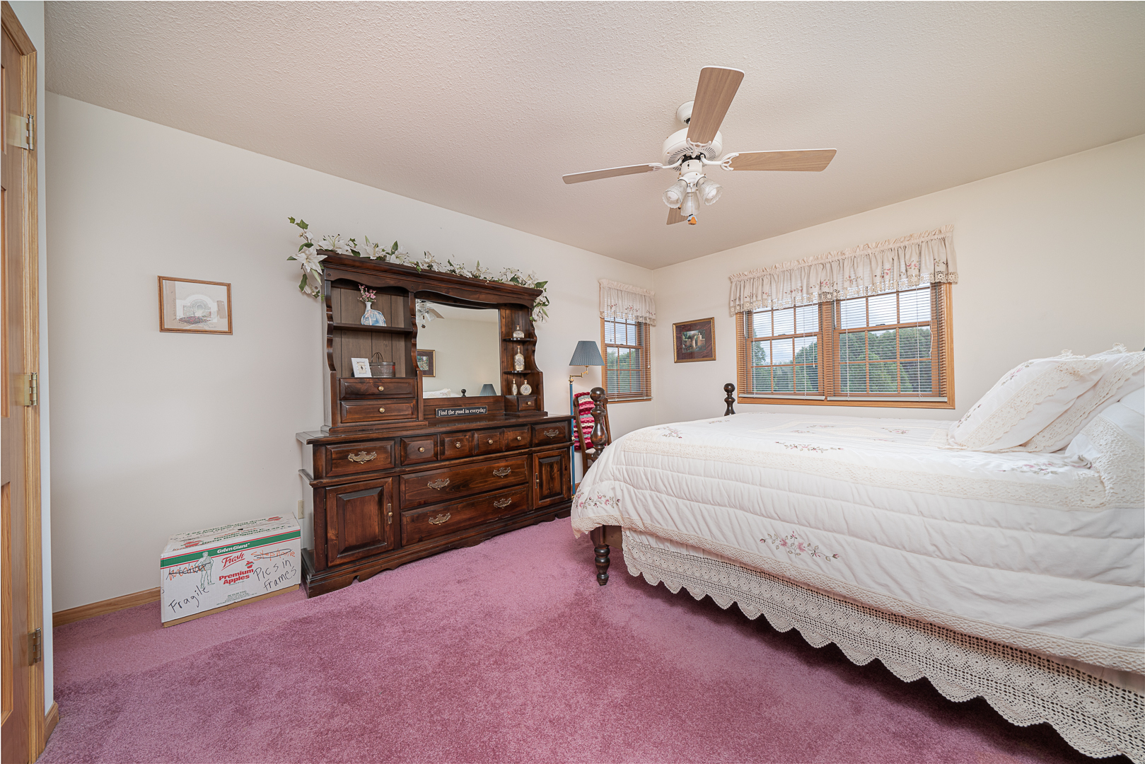 1901 Wildcat Road Dixon, IL 61021 - Photo 28 of 49 a spacious bedroom with a bed and a dresser