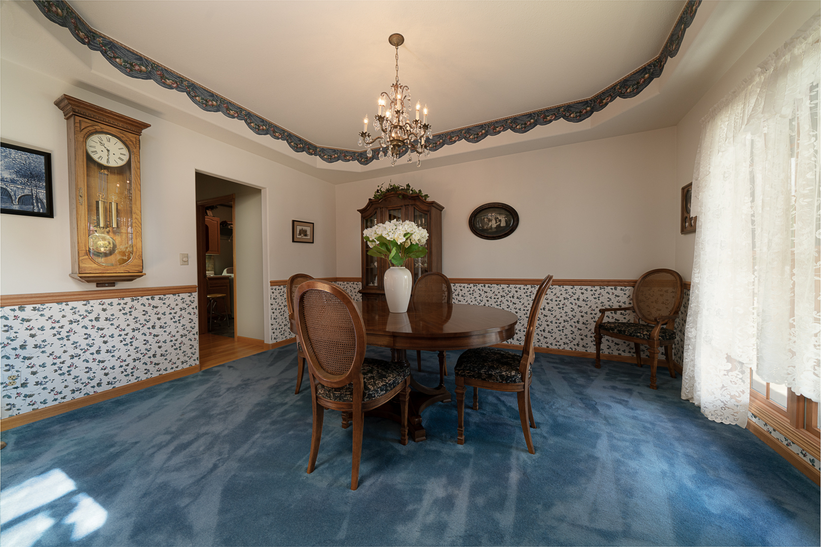1901 Wildcat Road Dixon, IL 61021 - Photo 4 of 49 a view of a dining room with furniture and chandelier