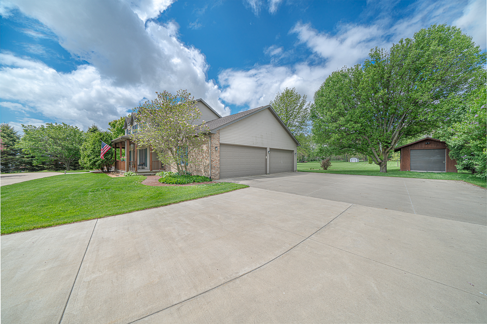 1901 Wildcat Road Dixon, IL 61021 - Photo 40 of 49 a view of a house with a yard and large tree