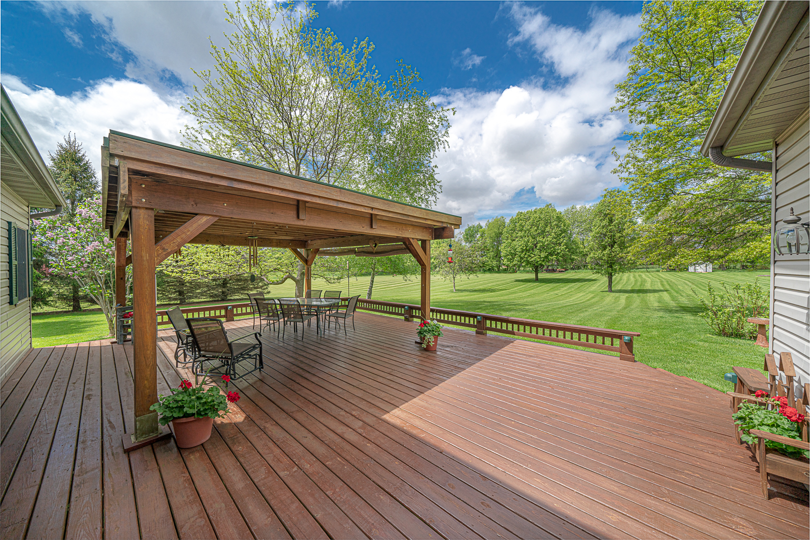 1901 Wildcat Road Dixon, IL 61021 - Photo 41 of 49 a view of a deck with wooden floor and outdoor space