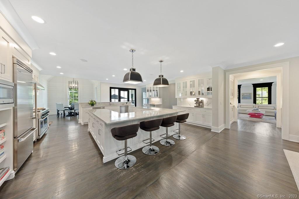 8 S Trail Darien, CT 06820 - Photo 4 of 38 a living room with furniture and a wooden floor