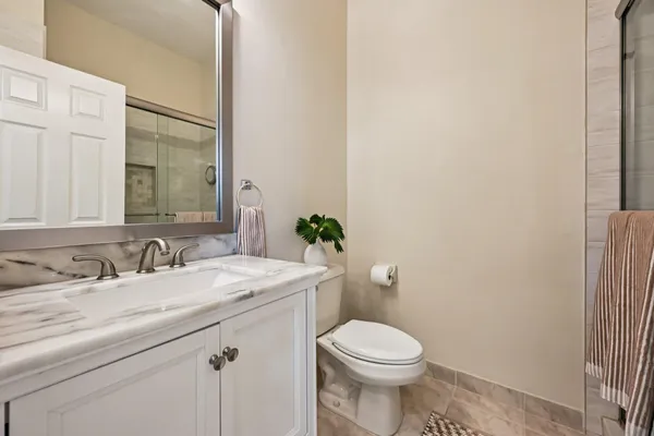 a bathroom with a sink and a toilet