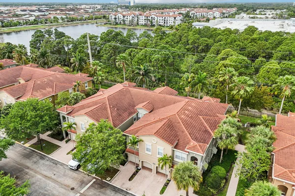 an aerial view of house with yard