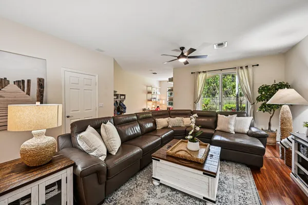 a living room with furniture and a window