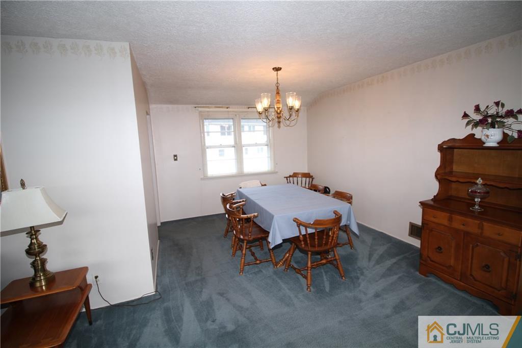 25 Montview Road Edison, NJ 08837 - Photo 11 of 21 a dining room with a table and chairs