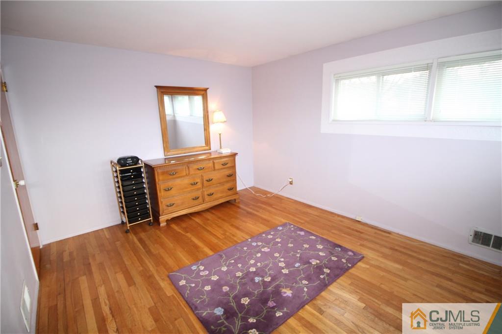 25 Montview Road Edison, NJ 08837 - Photo 14 of 21 a bedroom with a bed and a window