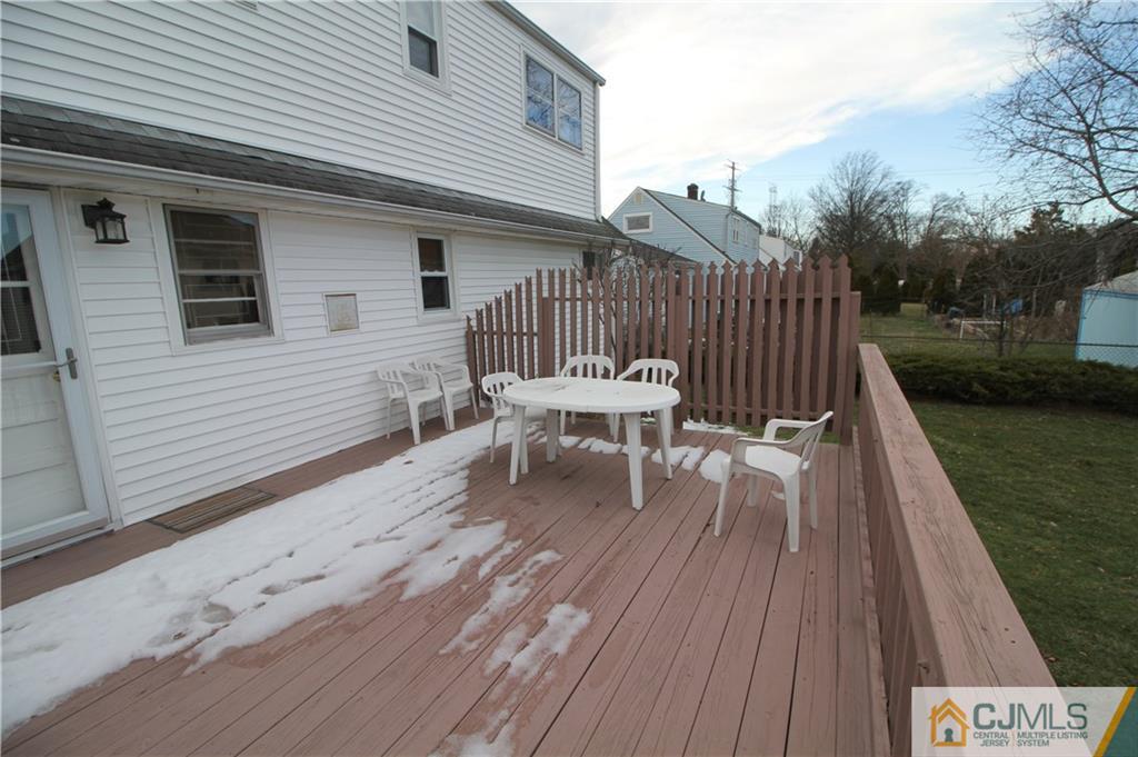 25 Montview Road Edison, NJ 08837 - Photo 21 of 21 a balcony with wooden floor table and chairs