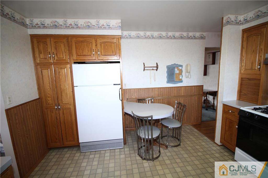 25 Montview Road Edison, NJ 08837 - Photo 5 of 21 a room with a table and chairs