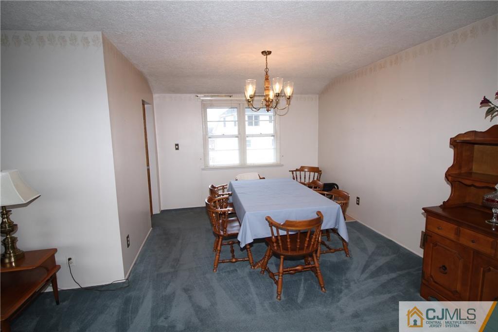 25 Montview Road Edison, NJ 08837 - Photo 10 of 21 a view of a dining room with furniture and wooden floor