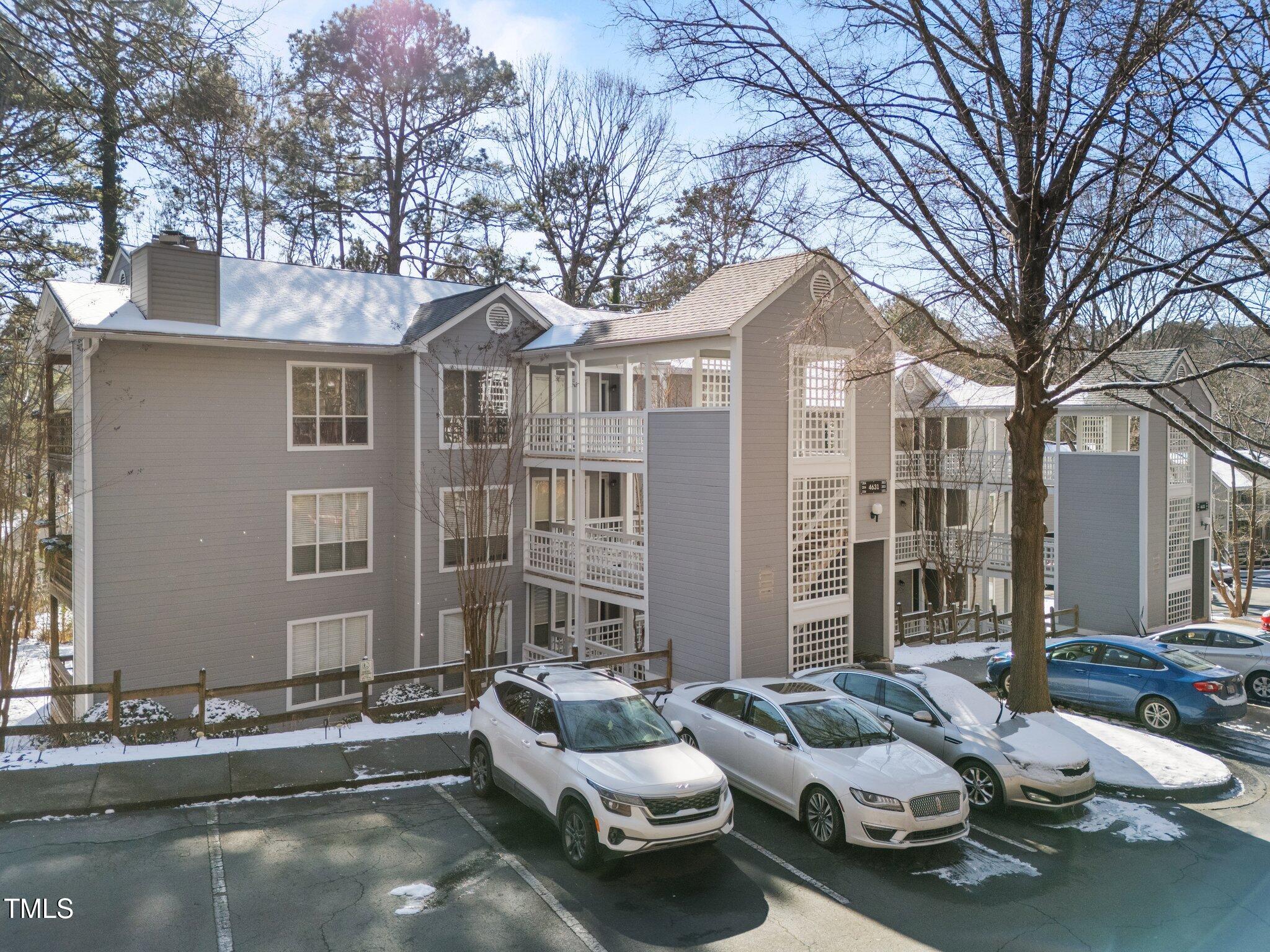 4631 Timbermill Court, Unit 301 Raleigh, NC 27612 - Photo 1 of 25 1-web-or-mls-DJI_20250122134816_0777_D