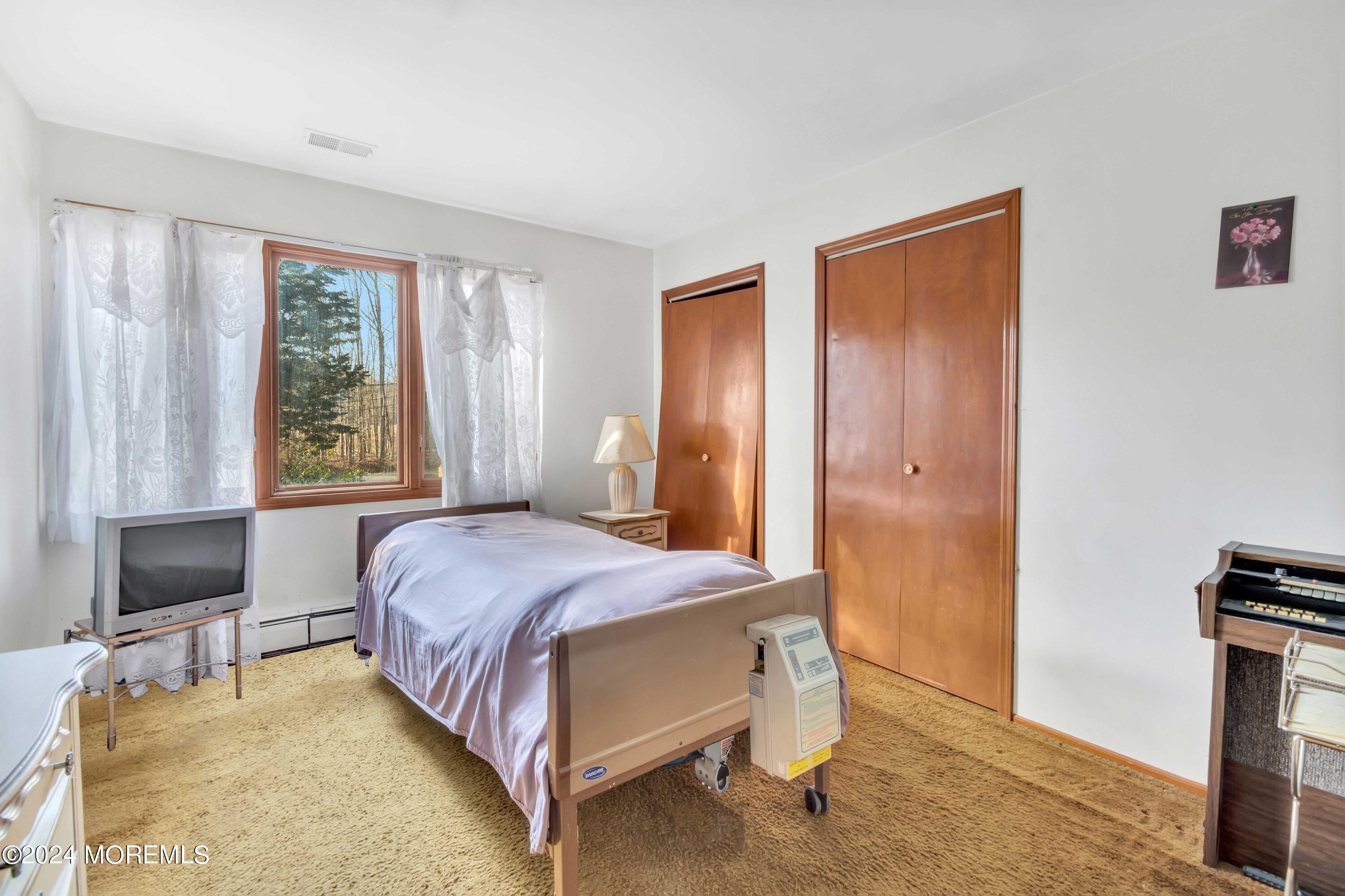 109 Crine Road Morganville, NJ 07751 - Photo 18 of 26 1st floor bedroom 2