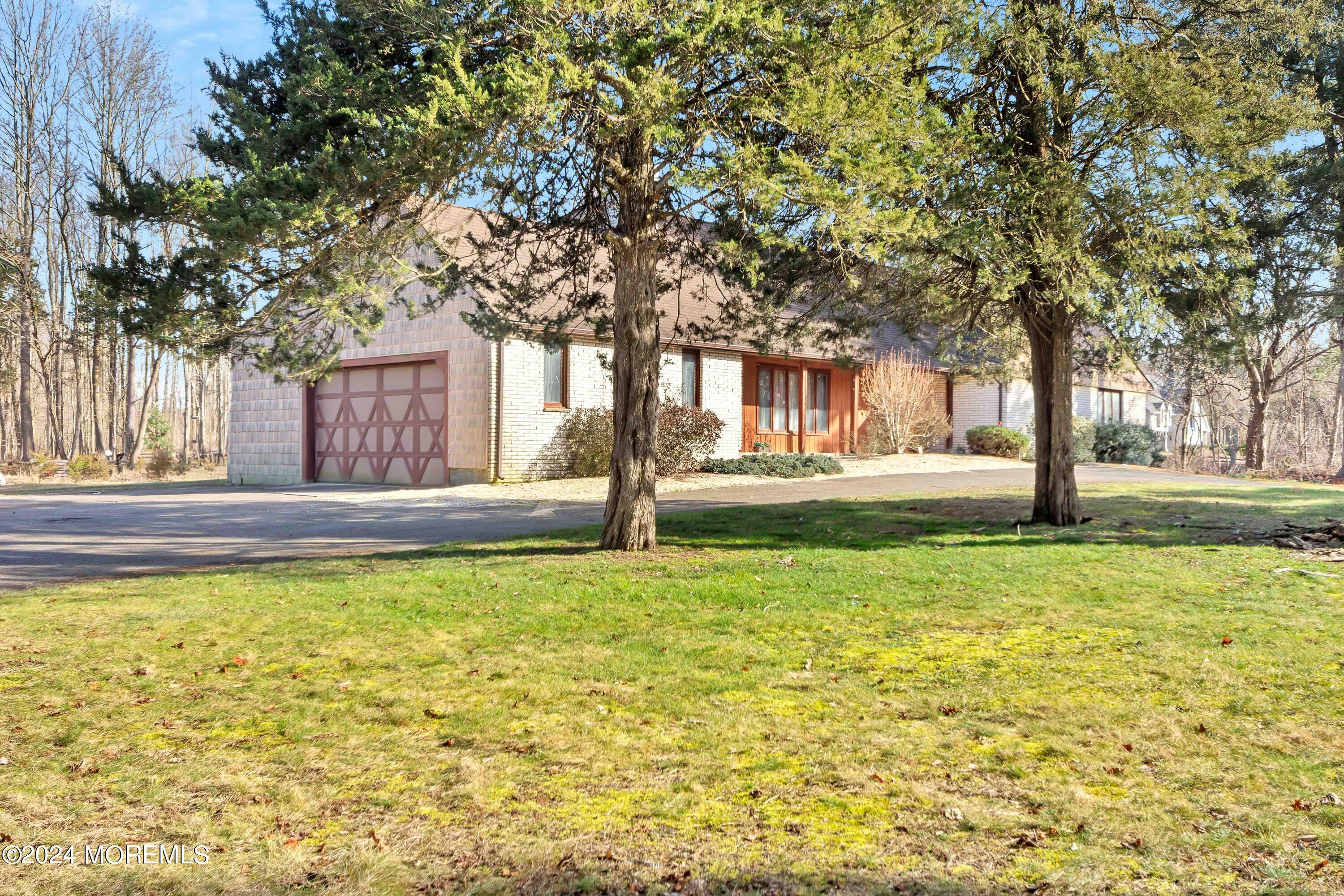 109 Crine Road Morganville, NJ 07751 - Photo 7 of 26 Front side view of house