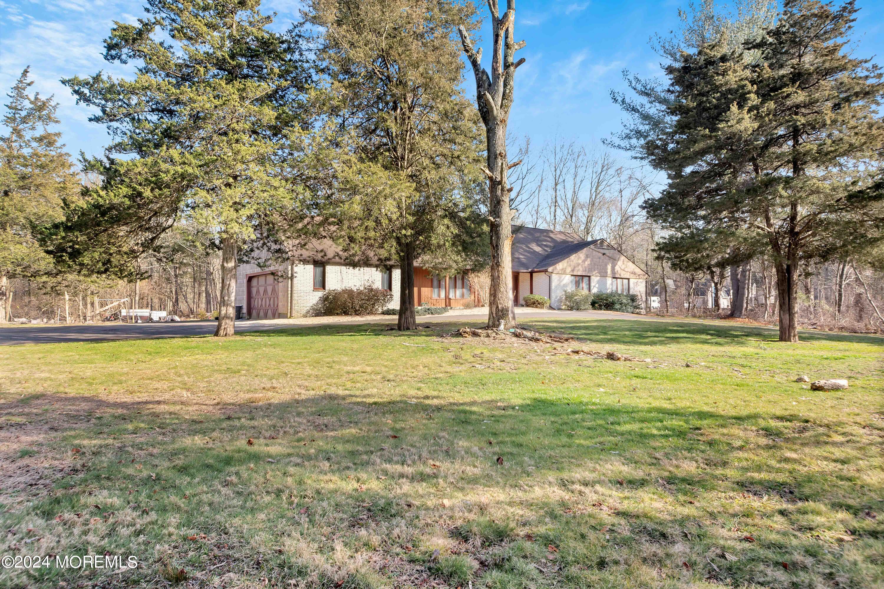 109 Crine Road Morganville, NJ 07751 - Photo 9 of 26 Front side view of home