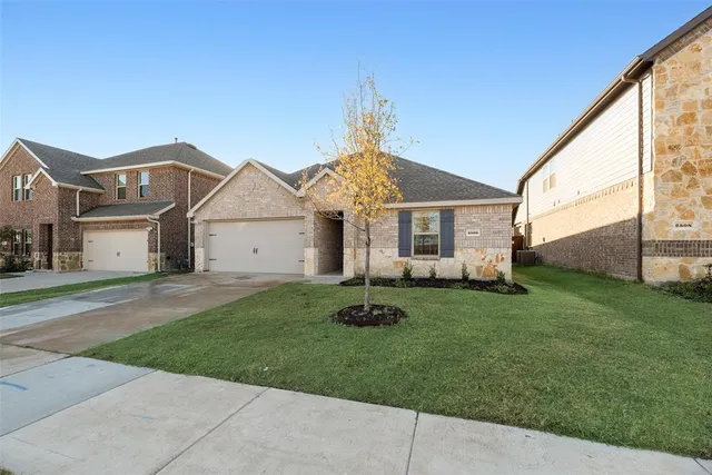 a house view with a garden space