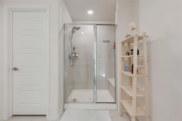 a work room with furniture and windows