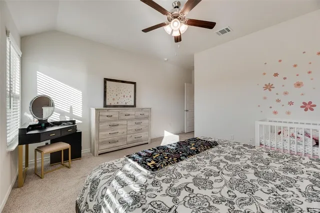 a bathroom with a sink toilet a mirror and shower