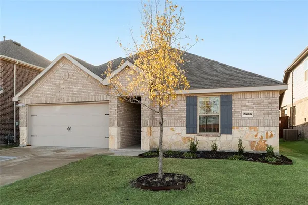 a view of a house with a garden