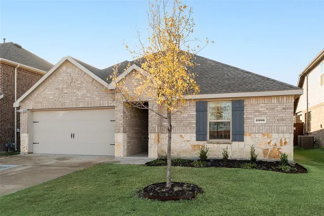 a view of a house with a garden