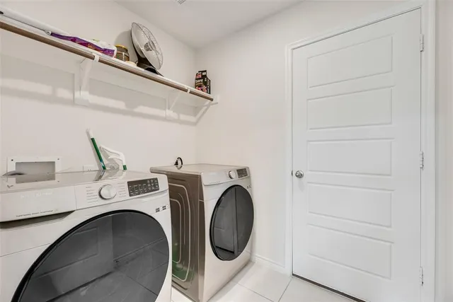 a bathroom with a toilet a sink and shower