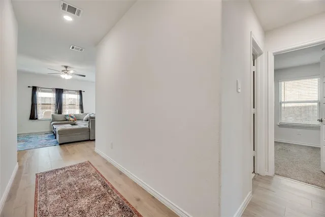 a view of a bedroom from the hallway