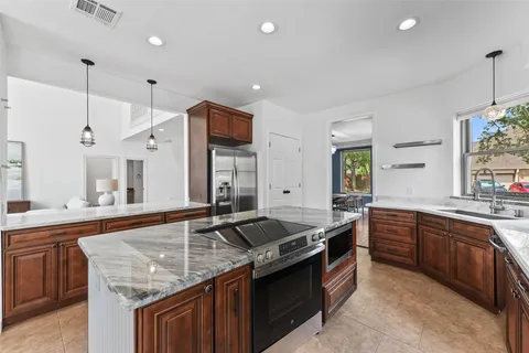 $570,000 | 12151 Maple Rock Drive, Houston, TX 77077